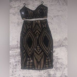 Black two piece outfit.